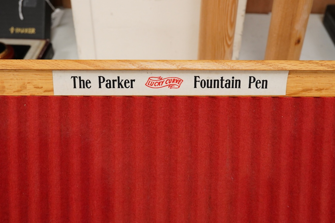 A display tray for 25 pens with Parker label to top